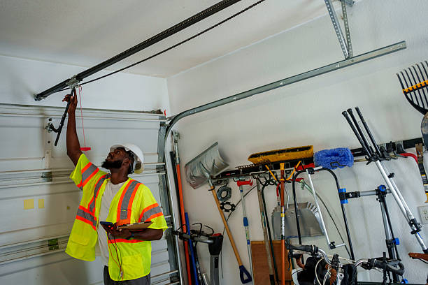 Professional Garage Door Roller Replacement technician working in North Warren, PA